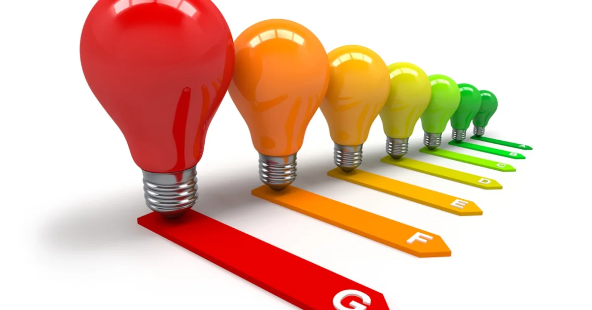 Energy efficiency rating scale illustrated with light bulbs.
