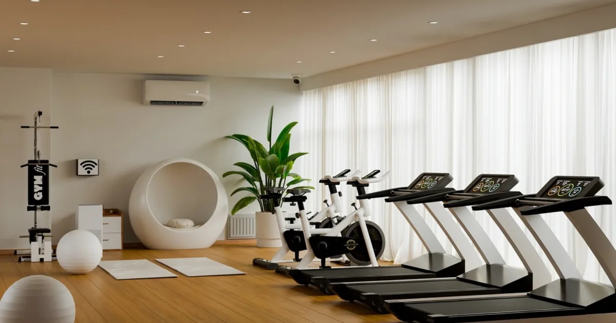 Modern gym and fitness suite with exercise equipment.